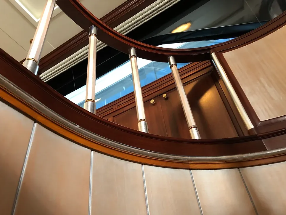 Metallic paint finish on curved staircase